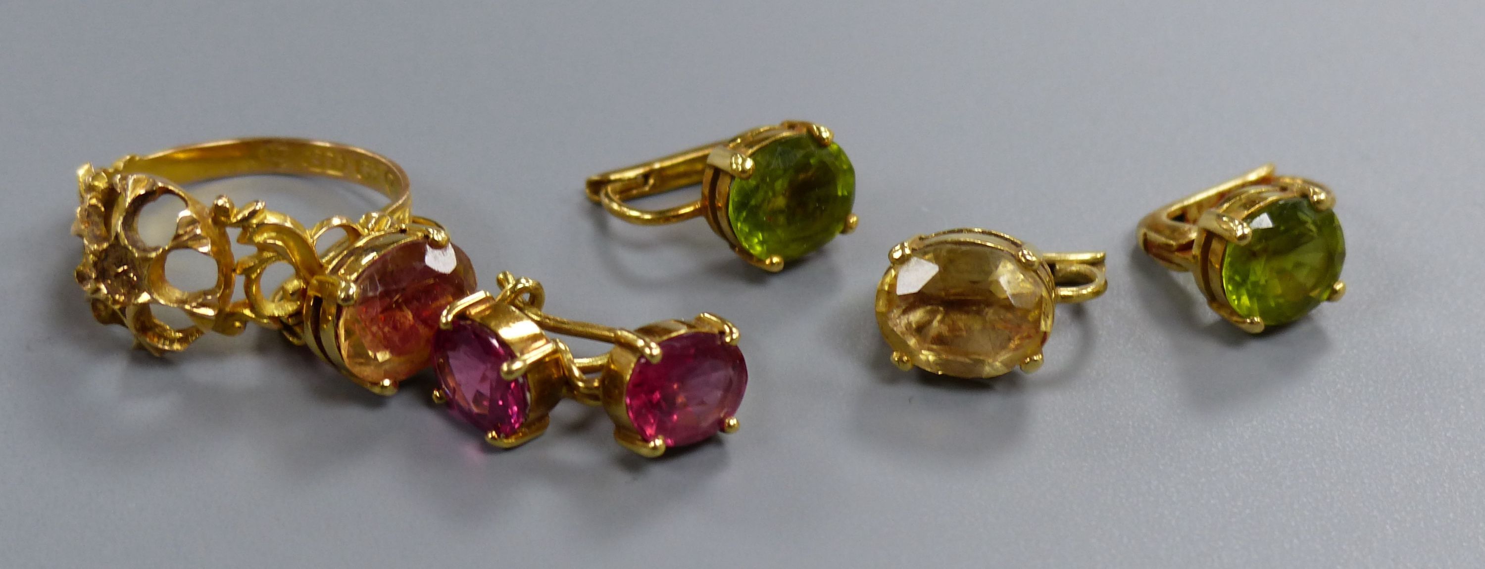 Five pairs of yellow metal and gem set earrings, gross 20.3 grams, three assorted yellow metal rings(a.f.) and a watch.